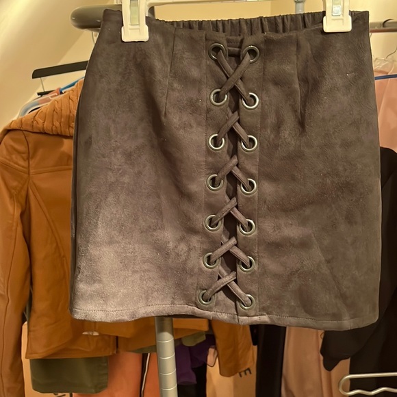 Forest green soft material cross pattern mini skirt. - Picture 1 of 2